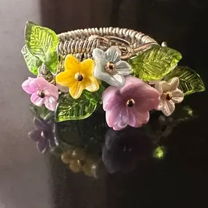 Whimsy Flower Garden Inspired Handmade Wire Ring with Colorful Floral Accents and Green Leaves