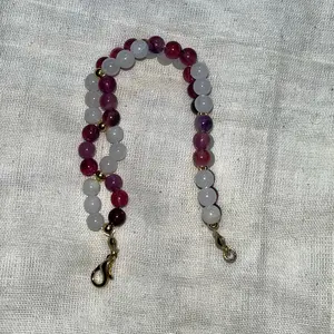Twisted Purple white beads with gold small ball  bead bracelet.