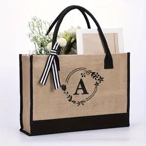 Large Capacity Jute Tote Bag with Floral Monogram "A" Print, Black Handles & Bow Accent - Lightweight, Open-Top Design for Shopping, Travel, Daily Commute - Durable & Stylish, Travel Tote Bag |   Floral Print Tote |   Jute Material, Tote Bag