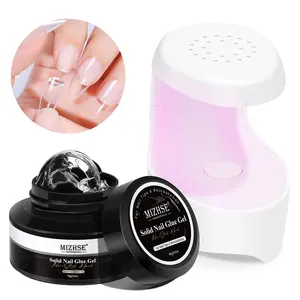 MIZHSE Solid Nail Glue, 18g Solid Nail Glue Gel for Nails and Mini U V Light LED Lamp for Nail Cured Solid Gel Nail Glue for Acrylic Nails, Nail Tips Long Lasting Rhinestone Glue for Nail Salon