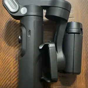 Product Review of Handheld 3 Axis Anti-shake Shooting Stand (1 Count), Rotating Automatic Face Tracking Tripod Stabilizer for Live Video, Phone Accessories, Content Creator Tools from R**y