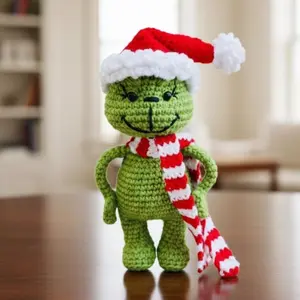 Crochet Baby Christmas Green Villain Amigurumi Green Elf Festive Holiday Decoration Handcrafted Yarn for Crafting Unique Christmas Decor