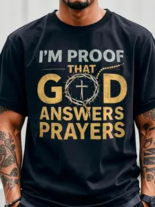 Men's Inspirational Cotton T-shirt Featuring I Am the Proof of God's Response to Prayer with Golden Crown Cross Design and Lettering Perfect for Church Easter and Christmas in White and Black Crew Neck Short Sleeve