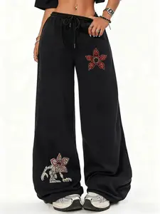 Stranger Things Demogorgon Floral Baggy Sweatpants for Women, Athleisure Pants, Vibrant Villain Print & Show Logo, Premium Soft Fabric, Oversized Casual Lounge Bottoms for Sci-Fi Horror Fans & Daily Trendy Wear