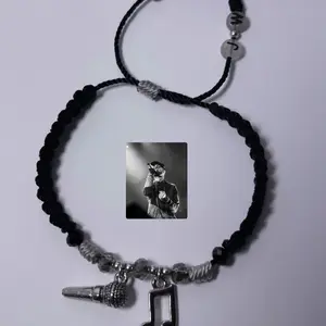 Jay W Bracelet with Black Cord and Charms, Featuring a Black and White Photograph, Adjustable Design