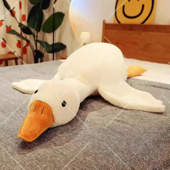 Cute Big White Goose Plush Pillow Toy! Large and irresistibly huggable, it's a favorite for both kids and adults. Suitable for all beds, offering cozi