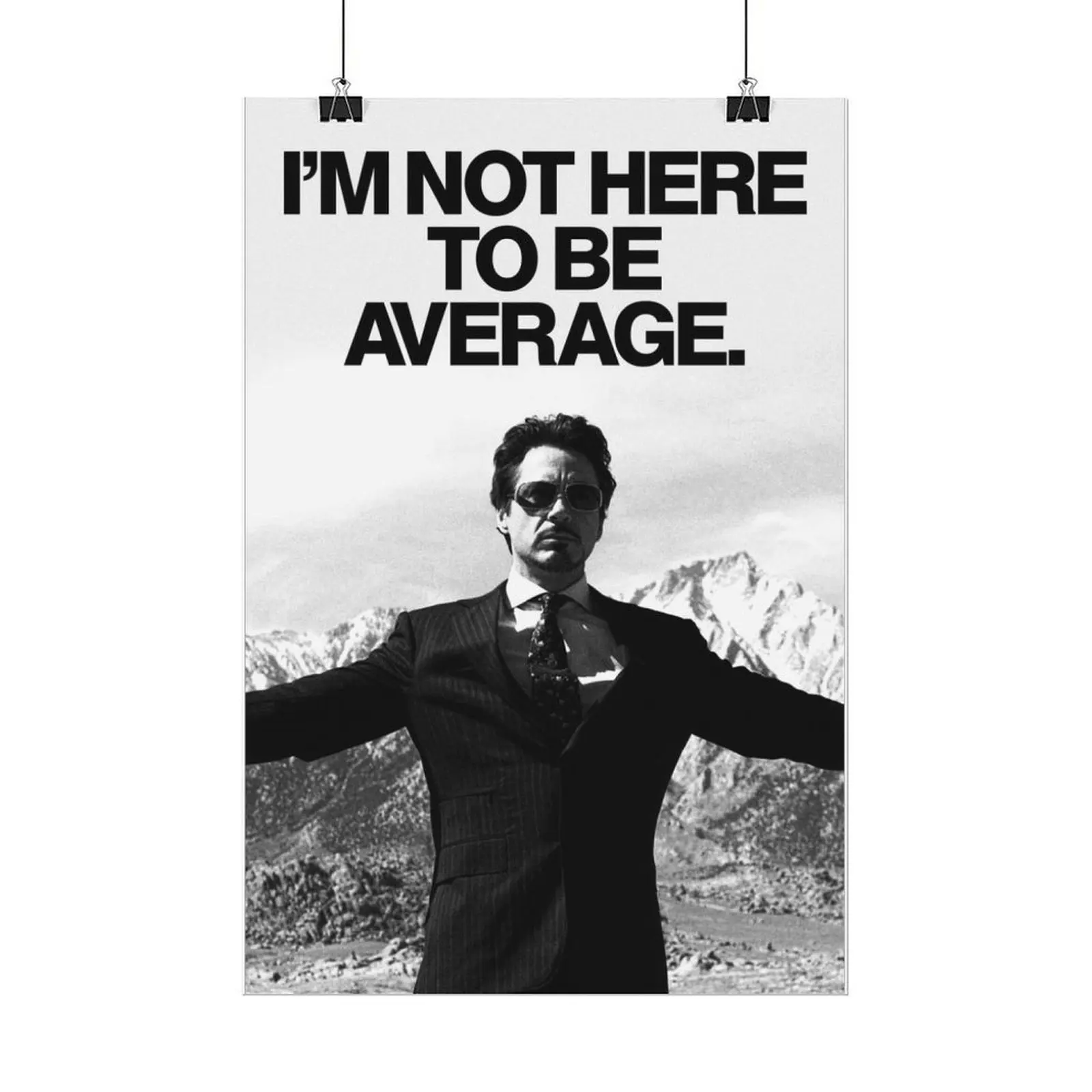 I'm Not Here to Be Average Inspirational Poster with Man in Suit and Mountains Background