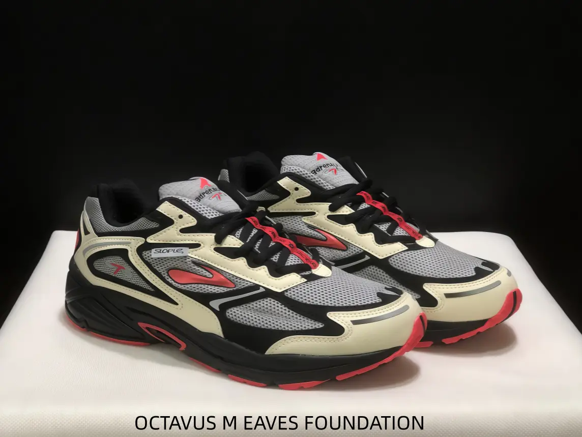 Bold Red Accents With Gray And Cream Panels — A Statement Sneaker For Athletes Who Love To Stand Out On The Street Or Track