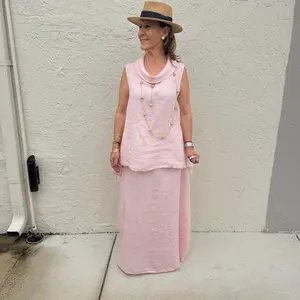 Fits from small to extra large one size 100 percent linen two piece set Anaí top and Lourdes skirt breathable lightweight natural fabric elegant summer outfit relaxed chic silhouette versatile matching set Ibiza style effortless look perfect for beach day