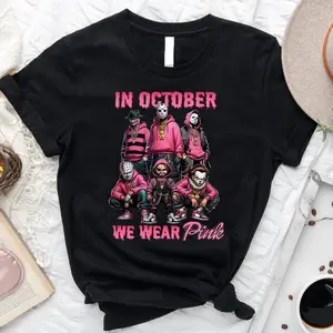 In October We Wear Pink T-Shirt | Horror Characters Streetwear Graphic | Halloween Horror Movie Tee | Pink Horror Villains Shirt