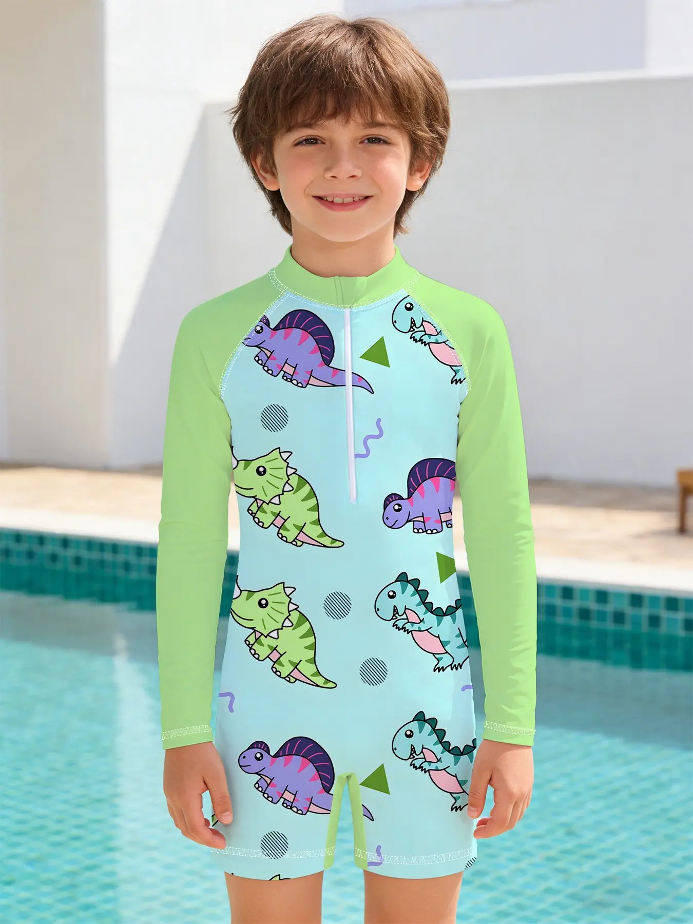 Boys' one-piece swimsuit "Colorful Dinosaur Dynamic Edition" with long sleeves and front zipper design, skin-friendly, quick-drying and non-stuffy, suitable for seaside vacations, pool fun and summer hot spring wear.