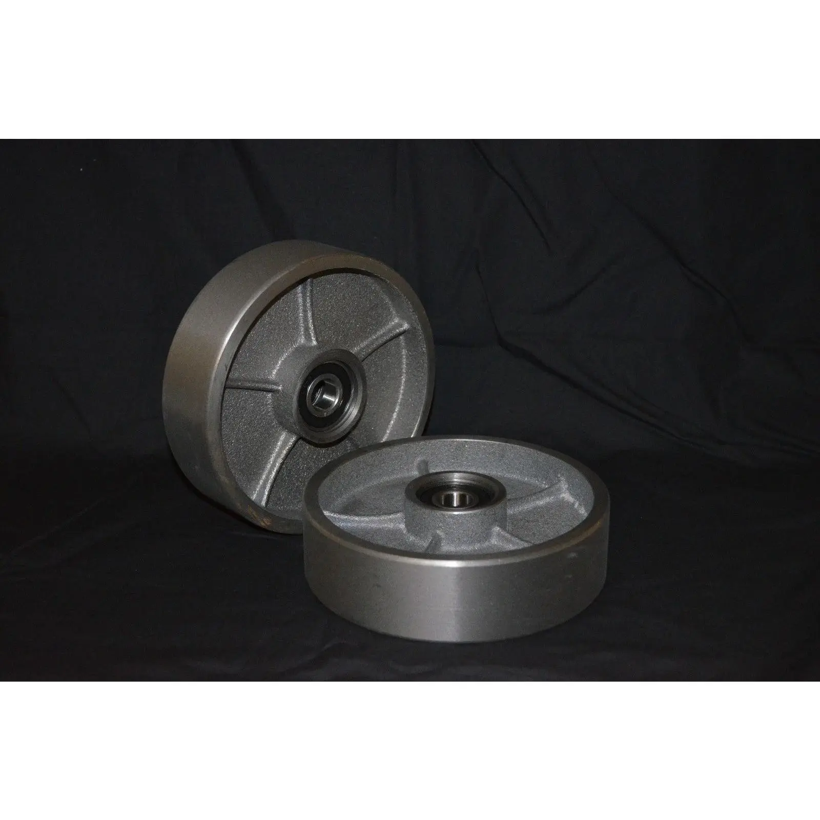 A Pair of Brand New Pallet Jack Steel Steer Wheels With Bearings