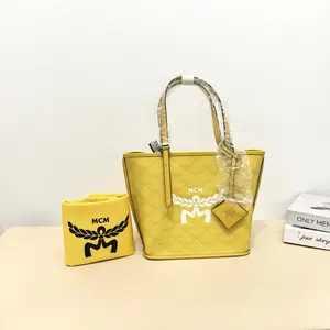 Pre-owned MCM Calfskin Tote Bags Anya Small Tote Bag (Yellow) B8060402
