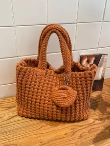Casual, versatile, and soft bohemian crochet bag with handcrafted artistry, featuring a trendy and stylish vibe. Includes an inner pocket and adorable hanging decorations, perfect for exhibitions, dates, or commuting