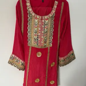 Hot Pink Cord Set with Intricate Embroidery and Gold Accents for Festive Wear