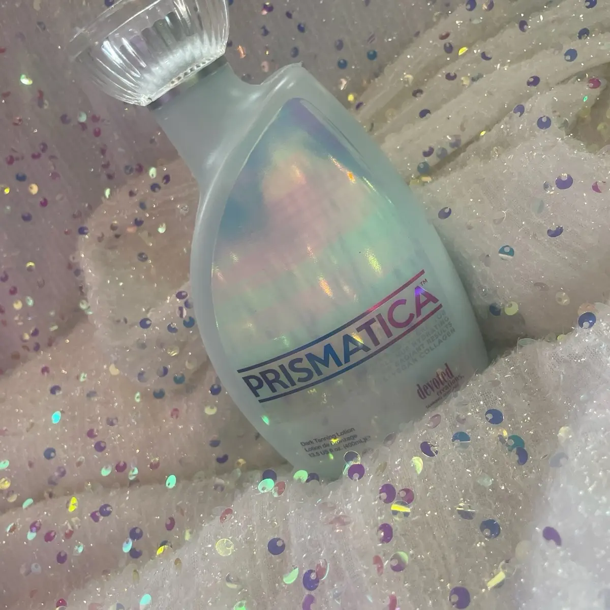 Devoted Creations Prismatica Dark Tanning Lotion