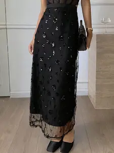 A women's fashionable French style light luxury sequin chiffon skirt in black, high waisted and slimming mesh skirt, suitable for summer, suitable for bar and restaurant dates, commuting, beach vacations, and home stays