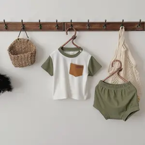 Breathable, Comfortable Summer Baby Set — Patchwork Short-Sleeve Top with Pockets + Soft Olive Green Shorts, Versatile Infant/Toddler Outfit
