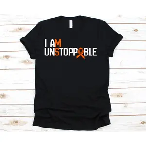 Women's Multiple Sclerosis Awareness Graphic T-Shirt - Short Sleeve Crew Neck Regular Fit Casual Wear | Soft & Breathable Fabric, Durable Print, Everyday Comfort, Machine Washable, minimalist and inspirational product display on a wooden background