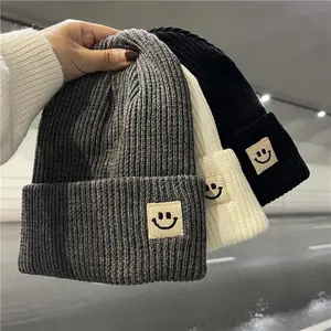 Unisex Winter Knitted Beanie Cute Smiley Patch Design, Warm Ear-Flap Hat, Trendy Versatile Black Headwear for Autumn & Winter