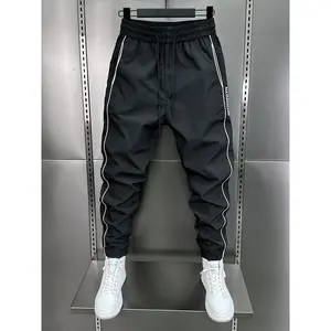 Summer thin quick-drying casual pants, patchwork perforated breathable air-conditioned pants, side stripe patchwork, jogger leg casual pants for men