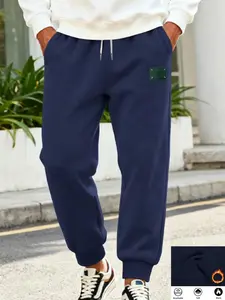 Men's loose-fitting fleece work pants, made of soft and comfortable fabric, windproof and warm. Casual outdoor work clothes and sport pants, thickened tapered long pants in the American daily style for autumn and winter