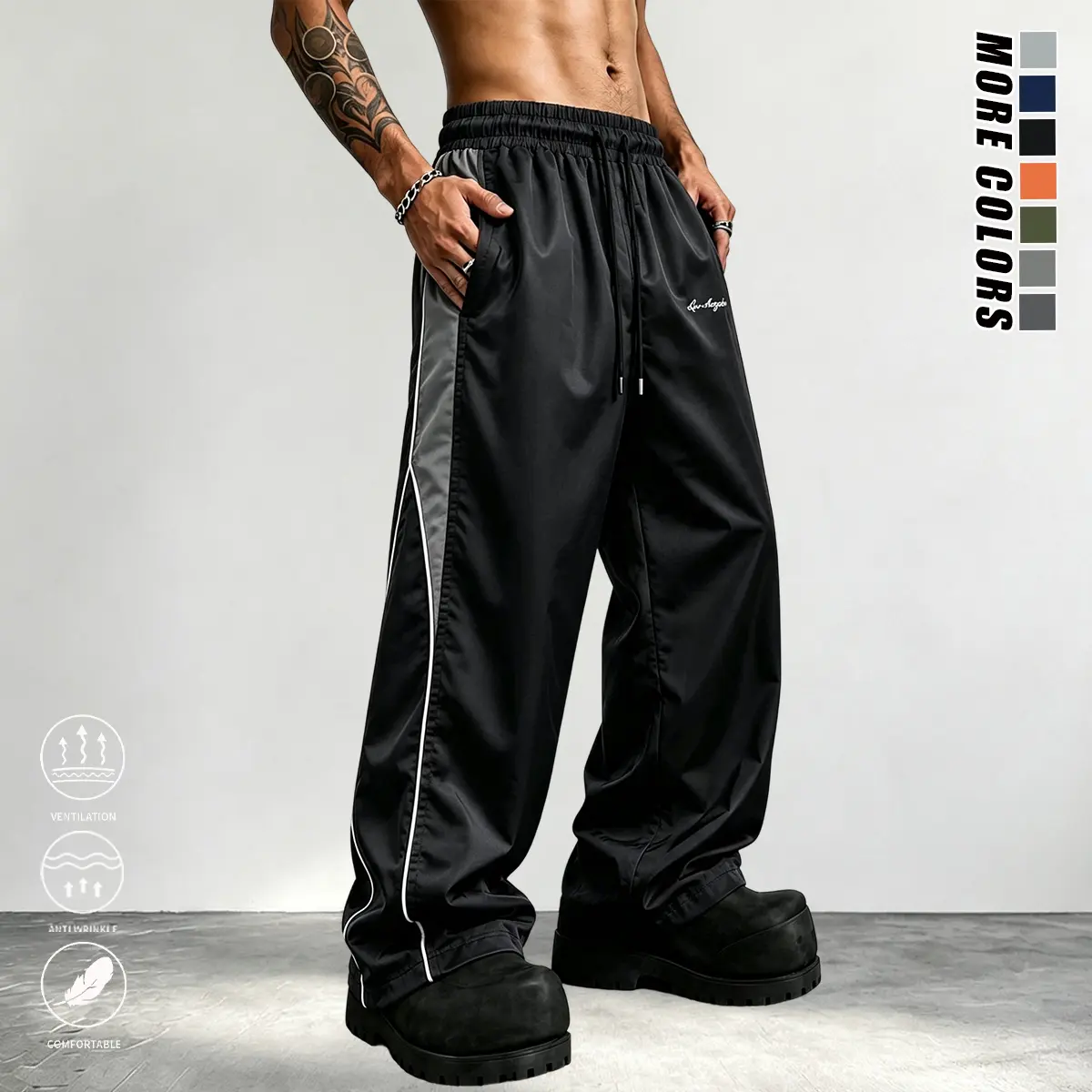 Men’s wide-leg casual pants with contrasting color reflective strips, smooth fabric, side stripes, American high-street style, suitable for daily commuting, trendy and versatile design. Menswear Tops Pockets