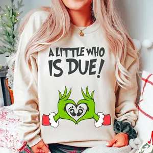 A Little Who Is Due Maternity Christmas Shirt/Sweatshirt, Funny Holiday Pregnancy Announcement Tee, Cute Winter Baby Reveal Outfit for Moms to Be, Unisex Cotton Gift for Expecting Mothers - EVA RAMOS