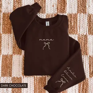 Custom This Mama Wears Her Heart On Her Sleeve Sweater, Personalized Mom With Kids Names Tees, Motherhood Gift, Mother's Day Gifts