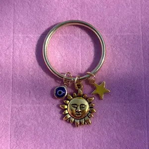 Celestial Key Ring with Sun Moon and Star Charms Gold Tone Accessory for Keys Cute and Stylish Keychain