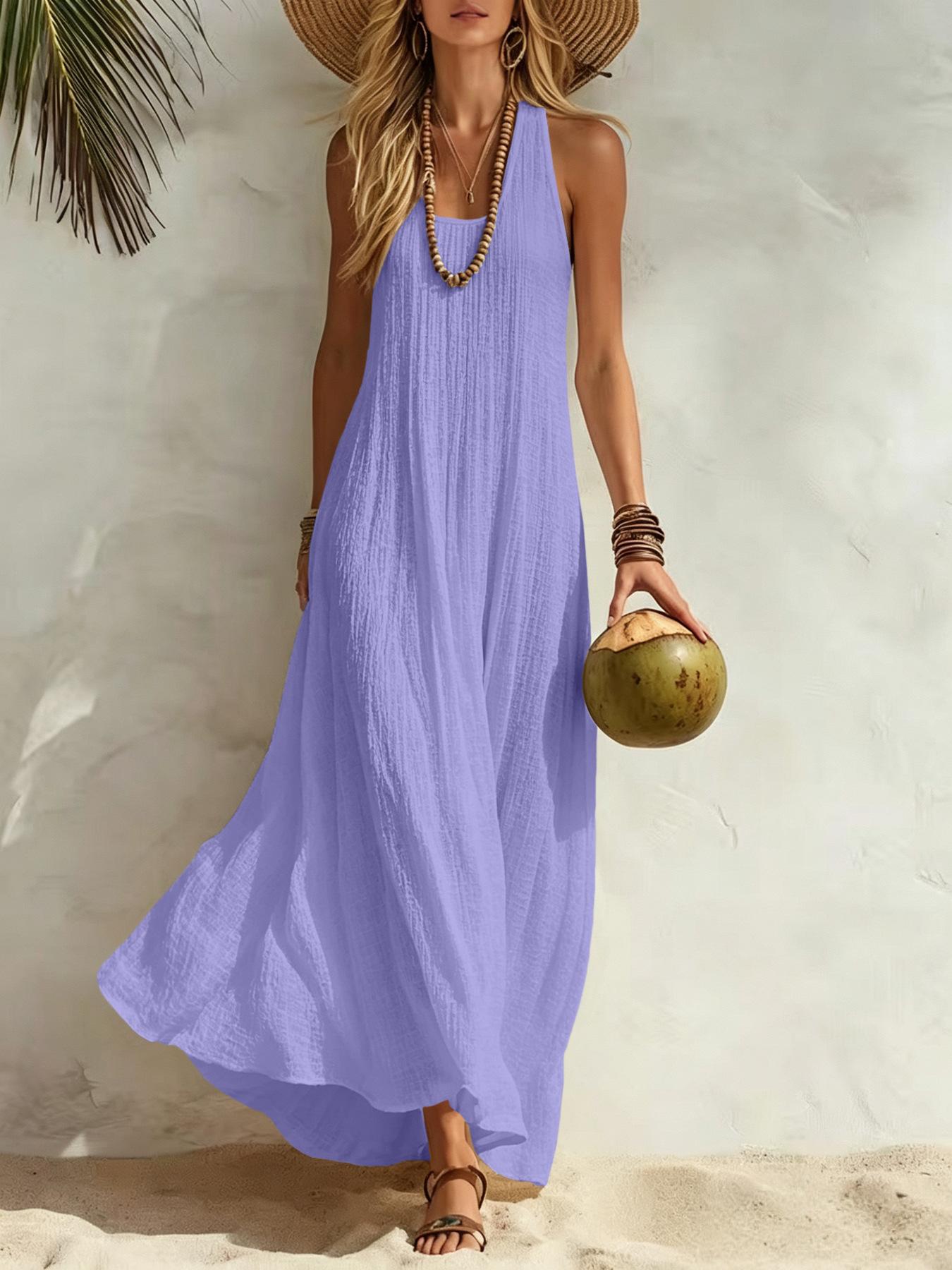 Women’s summer dress with a relaxed Bohemian beach vacation vibe—loose fit that flatters the figure and is comfortable, long length. Women’s summer dress with a relaxed Bohemian beach vacation vibe—loose fit that flatters the figure and is comfortable, long length.