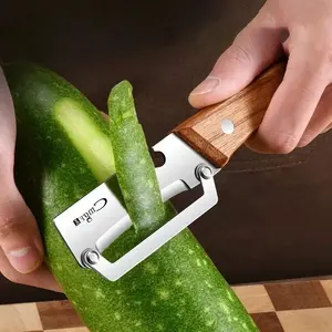1pcs Stainless steel peeler with wooden handle for peeling and slicing fruits and vegetables