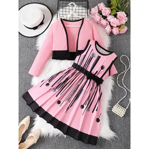 A Casual Dress Girls Featuring a Random Print, Round Neck, And Bow, Paired with a Fringed Cardigan Set. Made from Comfortable, Skin-Friendly, It'S Perfect Everyday Wear, Outdoor Activities, Parties, And Other Occasions