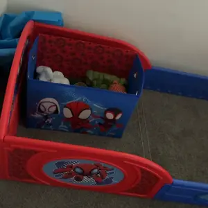 Marvel Spidey and His Amazing Friends 4-Piece Toddler Room-in-a-Box Set – Includes Sleep and Play Toddler Bed, Table, 1 Chair and Toy Box