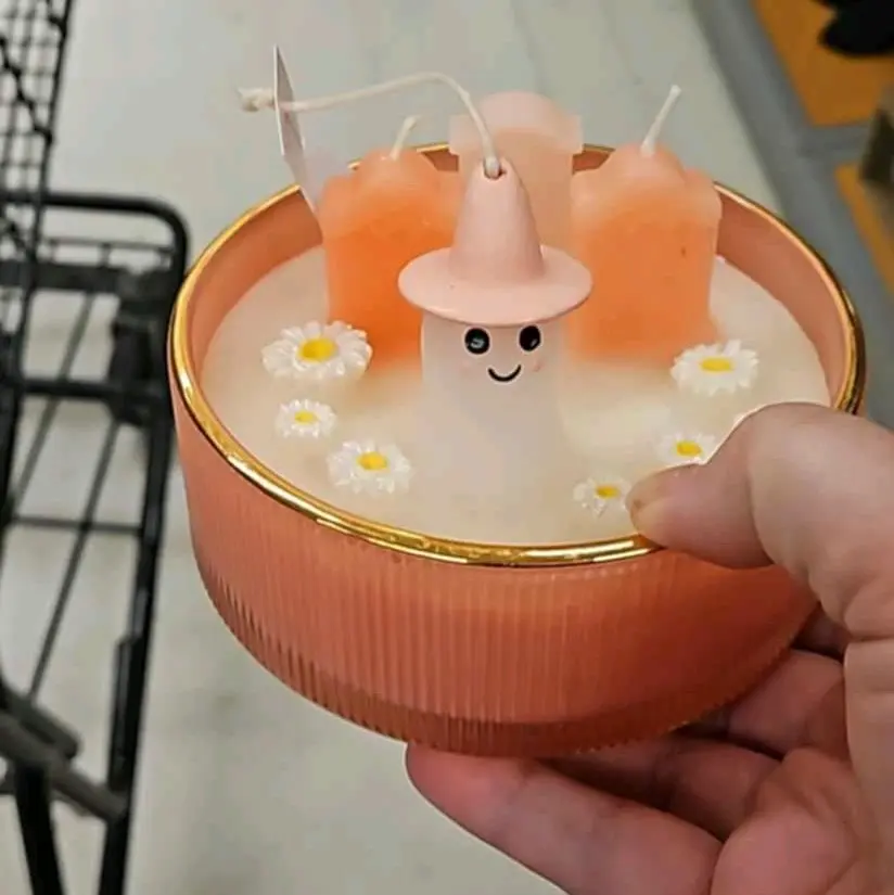 Pink ghost graveyard candle