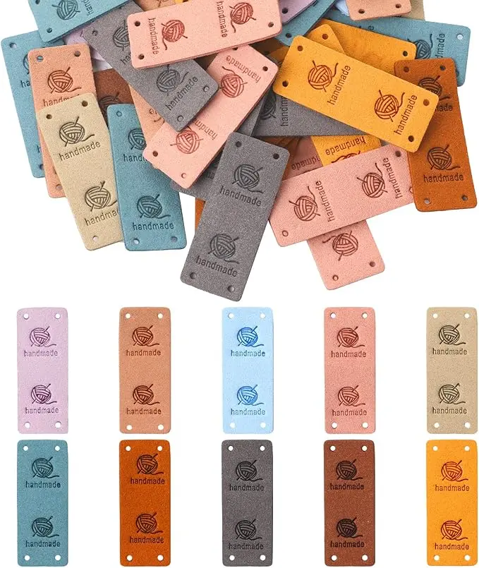 50 Pcs Leather Handmade Labels,PU Leather Tags for Crochet Accessories Folding Handmade Tags Knit Accessories with Holes Embossed Tag Embellishment Knit DIY Apparel Supplies for Jeans Bag Shoes Hat