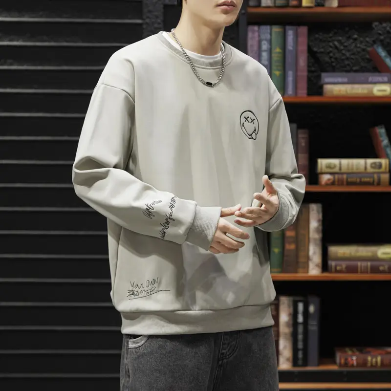 Men’s Cross Eye Smiley Face Embroidered Crewneck Sweatshirt, Soft Brushed Fleece Long Sleeve Pullover with Tiny Side Script Detail, Loose Fit Breathable Casual Top for Daily Commute, Streetwear & Urban Outings
