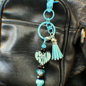 Customizable Keychains with Adjustable Beads Featuring Charms and Tassels in Vibrant  colors