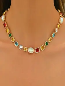 Tennis Necklace: A delicate 18K gold-plated diamond tennis necklace featuring a cubic zirconia chain set with emeralds, rubies, and aquamarines—the perfect gift for couples, brides, birthdays, weddings, and Valentine’s Day.