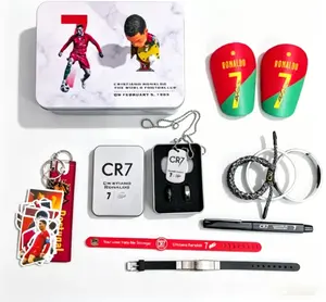 Ronaldo Gift Bundle(1 CR7 gift box+1 Keychain+1 Figure+1 Pen+1 Necklace+2 Rings+1 Pair Of Mini Shin Guards+5 wristbands)