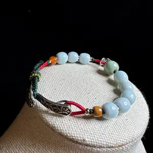 Handmade Chinese Celadon Bracelet with 925 Silver Lucky Elephant Charm