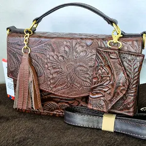 Crossbody Pachis - Hard Leather Handbag with Floral Embossing and Tassel Detail