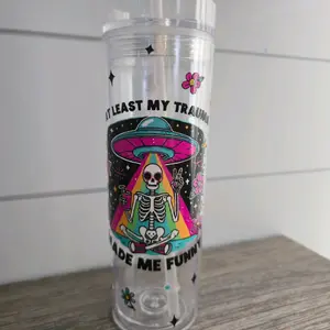 At Least My Trauma Made Me Funny 16oz Tumbler with Colorful Skeleton Design and Fun Quote
