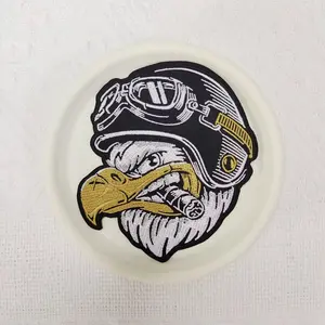 1PCS cartoon animal eagle head embroidery patch with retro motorcycle helmet design badge, suitable for DIY decorative patch patches on hats, bags, shoes, and clothing, with back hot melt adhesive for sewing and ironing