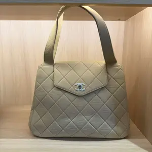 Pre-owned CHANEL Beige Quilted Leather CC Turnlock Tote Bag