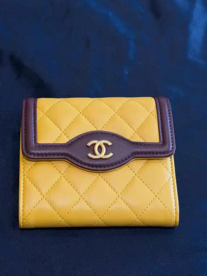 Pre-owned CHANEL Short Tri Fold Wallet in Yellow & Brown Color Block Leather with Gold Hardware, 2016 2017 Edition. Clear Laser Marking, 99% Like New Condition.