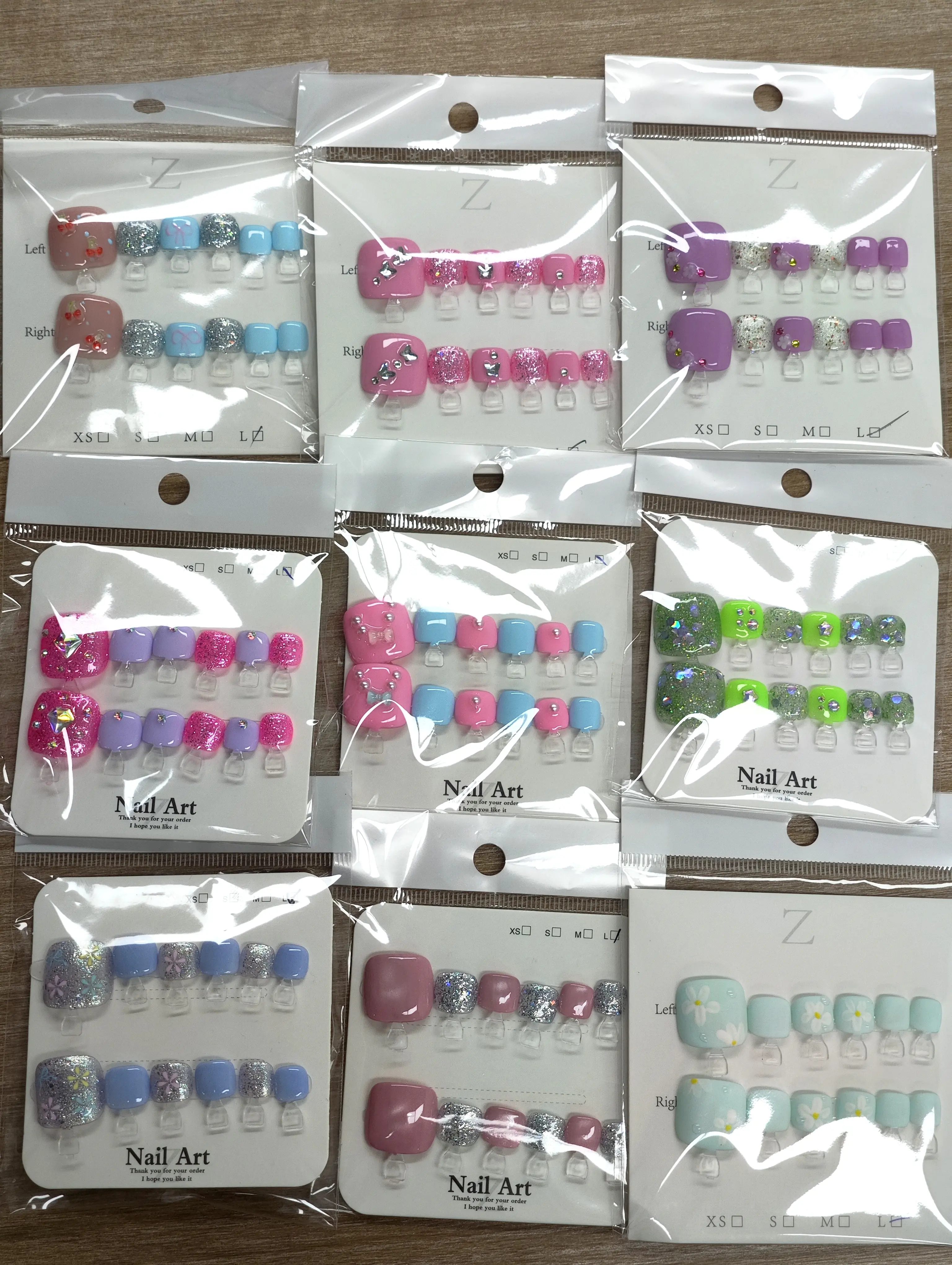 Rita(21446)gc.$30get21sets toenails selectable size with random styles (mystery box)