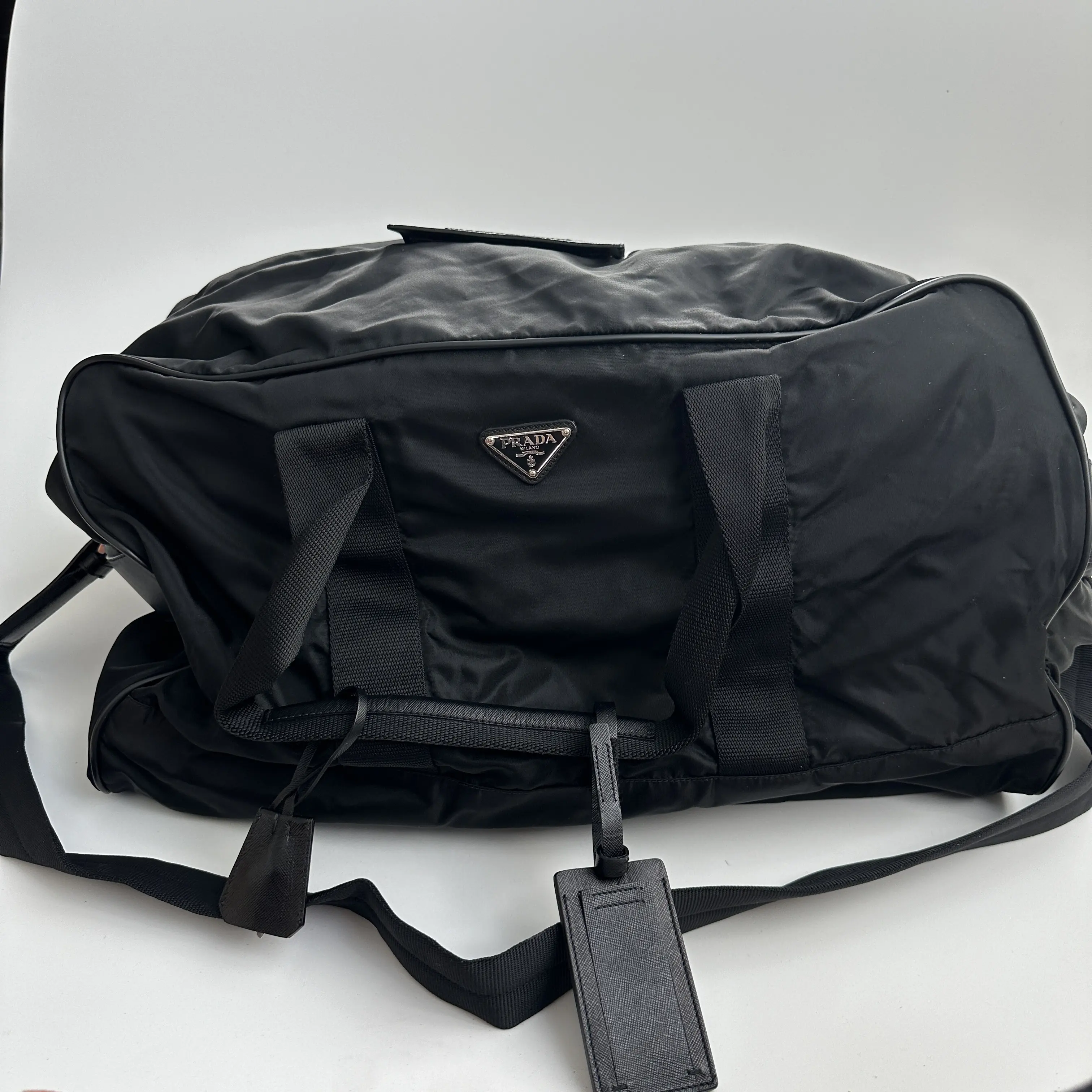 Pre-owned PRADA Nylon Luggage Black duffle bag with shoulder strap