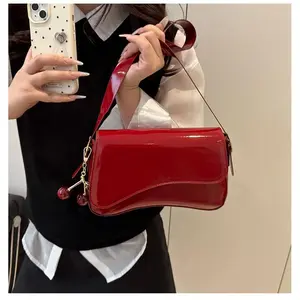 2026 New Red Patent Leather Underarm Bag, Flip Magnetic Buckle Shoulder Crossbody Bag, Minimalist Fashion Commuter Bag, Versatile Cherry Pendant Baguette Bag, Glossy PU Leather Luxury Women's Purse, Casual Dating Daily Handbag, Unique Curved Designer Bag,