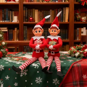Boy and Girl Christmas Elf Dolls—Quebec's Christmas Mischief-Makers: Santa's Naughty Little Helpers. Featuring soft fabric bodies, vinyl faces, and Velcro-grip hands—fun Christmas elves for the whole family to enjoy!